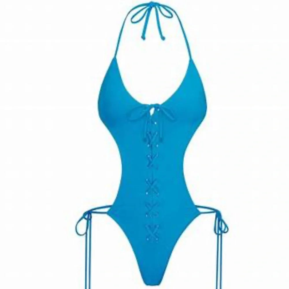 Skims NWT lace up swim suit turquoise SZ 4X